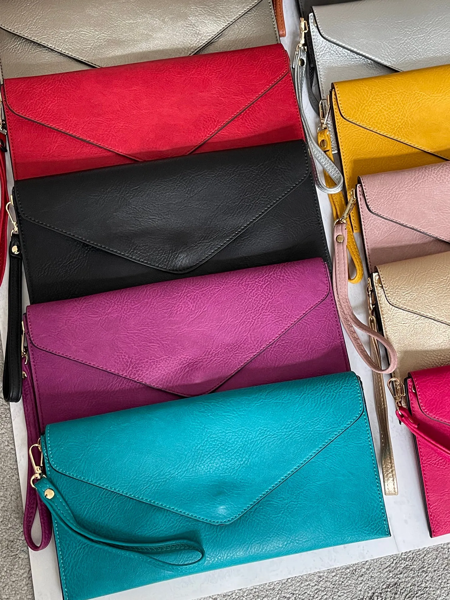 BLACK OVER-SIZED ENVELOPE CLUTCH BAG WITH LONG CROSS BODY AND WRISTLET STRAP